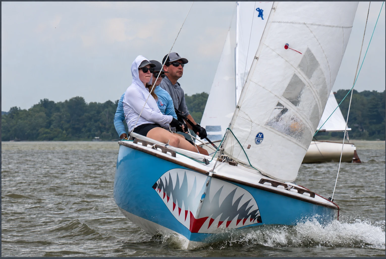 Thomas racing aboard Team Shark Bait